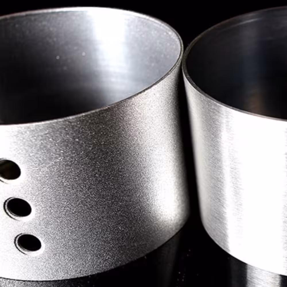 Shot blasting for coating adhesion